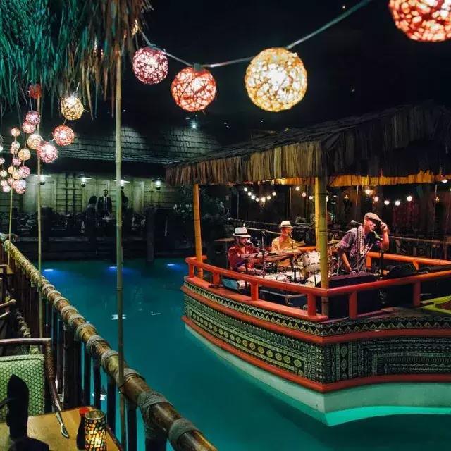 The house band plays in the lagoon of the world-famous Tonga Room at San Francisco's Fairmont Hotel.